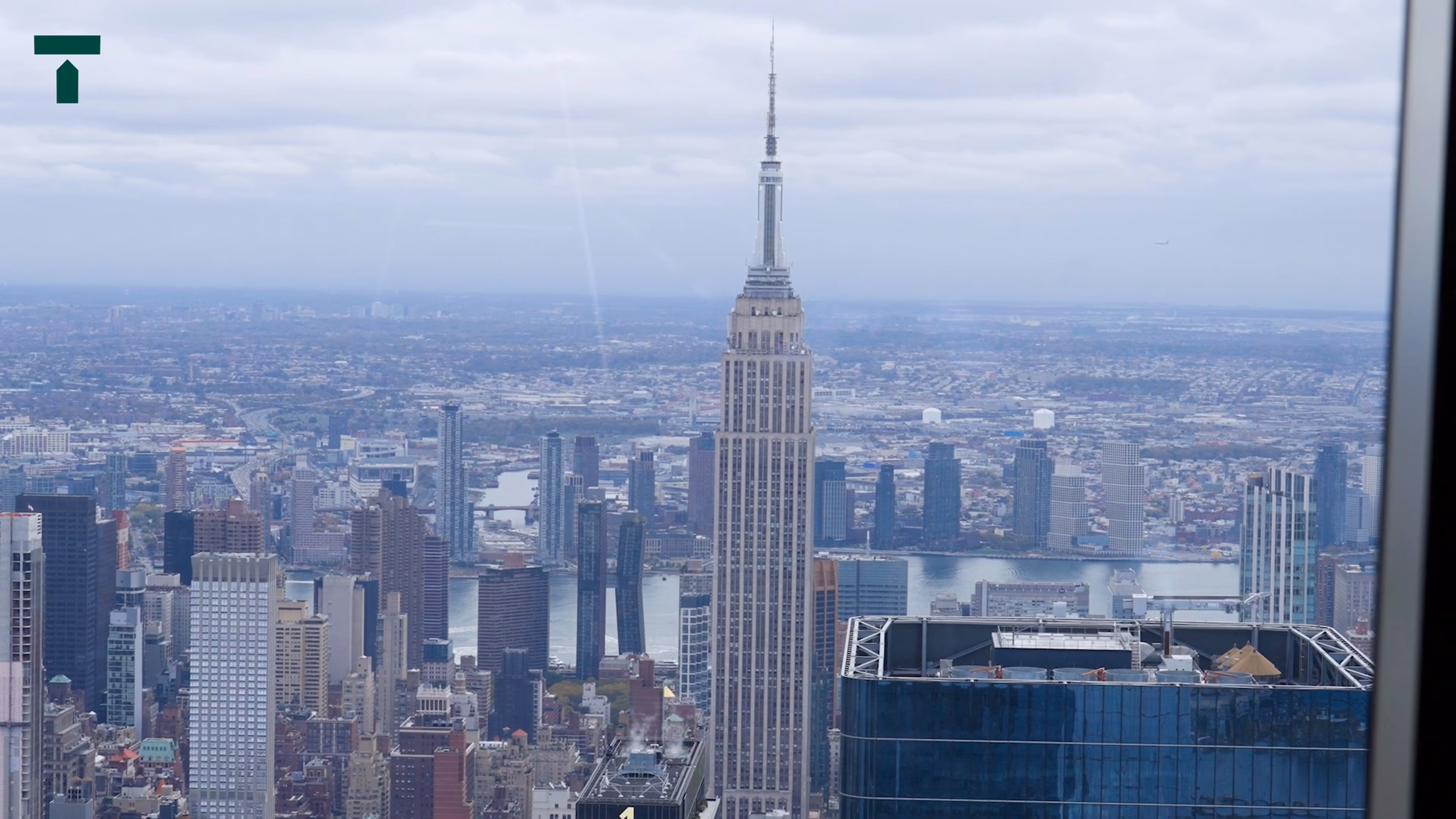 Panel conversation above the Manhattan skyline from the Trullion event film
